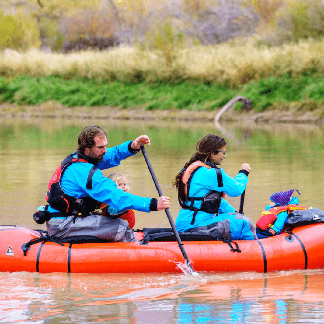 Packraft Europe paddling Alpacka Raft Oryx (tandem packraft) with two children on board using the Shred Apart