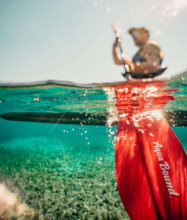 kayaker using Aqua Bound's kayak paddle