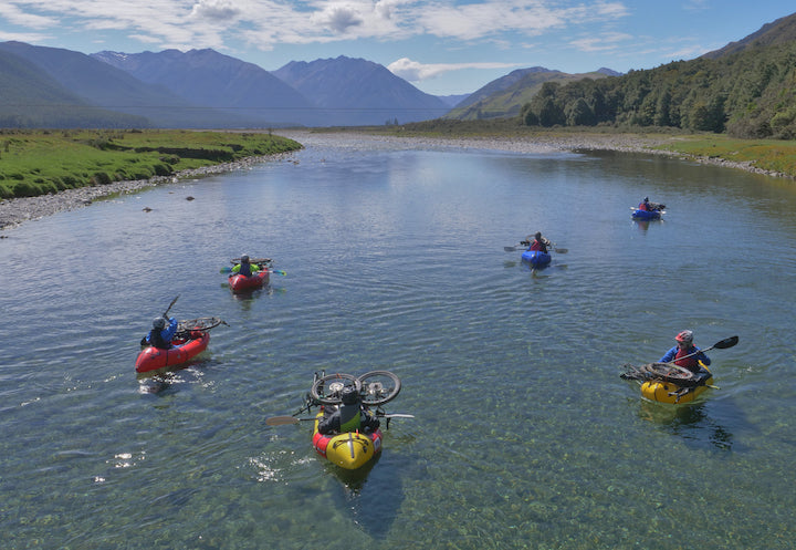 Group of paddlers bikerafting on New Zealand’s beautiful Hurunui River