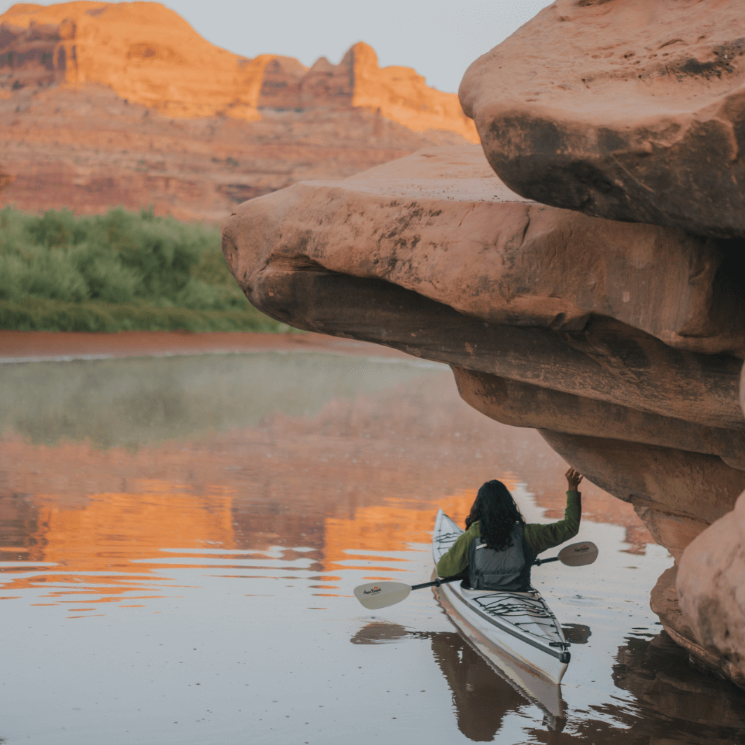 sting ray hybrid 2-piece versa-lok white held  by man in white kayak#color_white