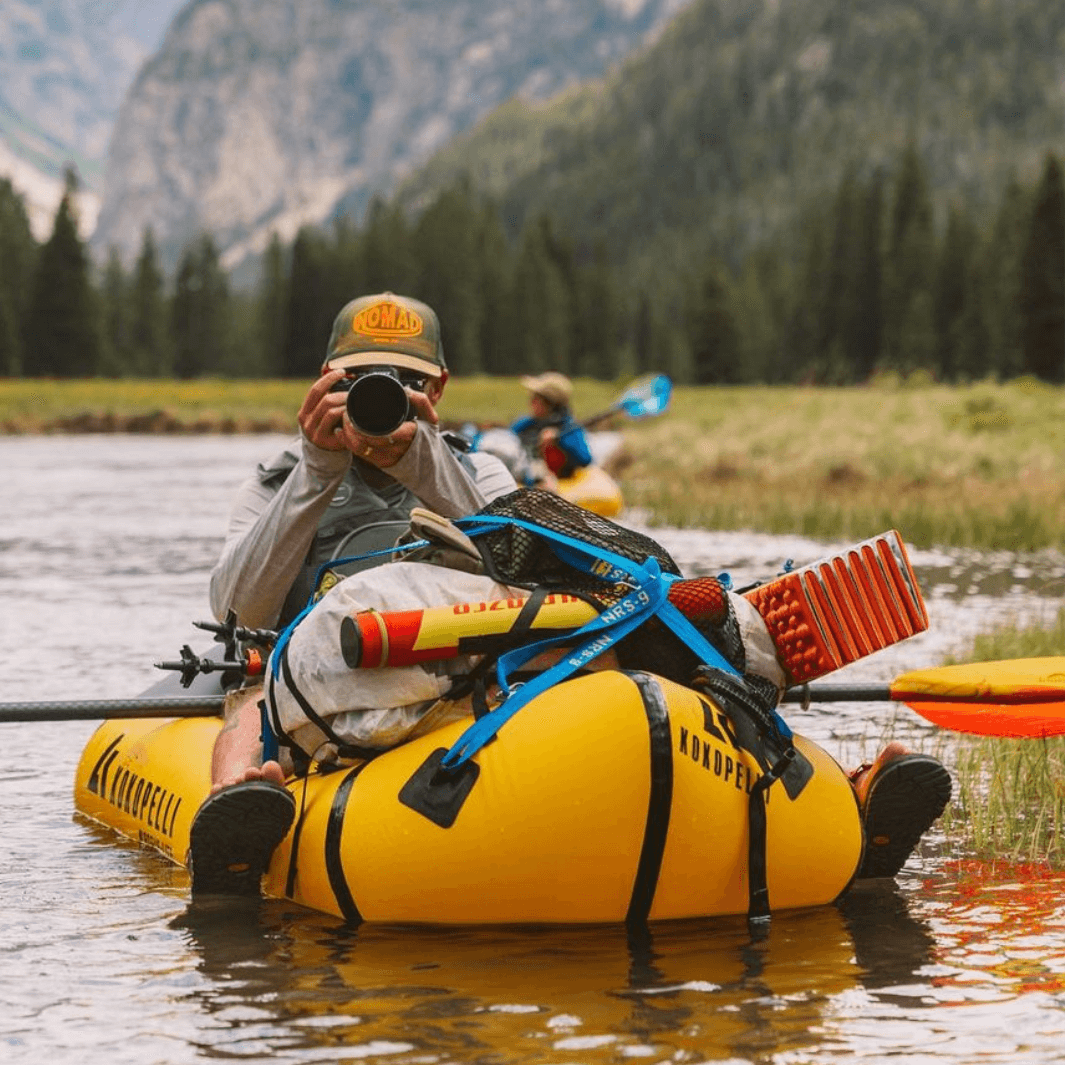 tango fiberglass 4-piece posi-lok kayak paddle fuego being paddled in packraft#color_fuego